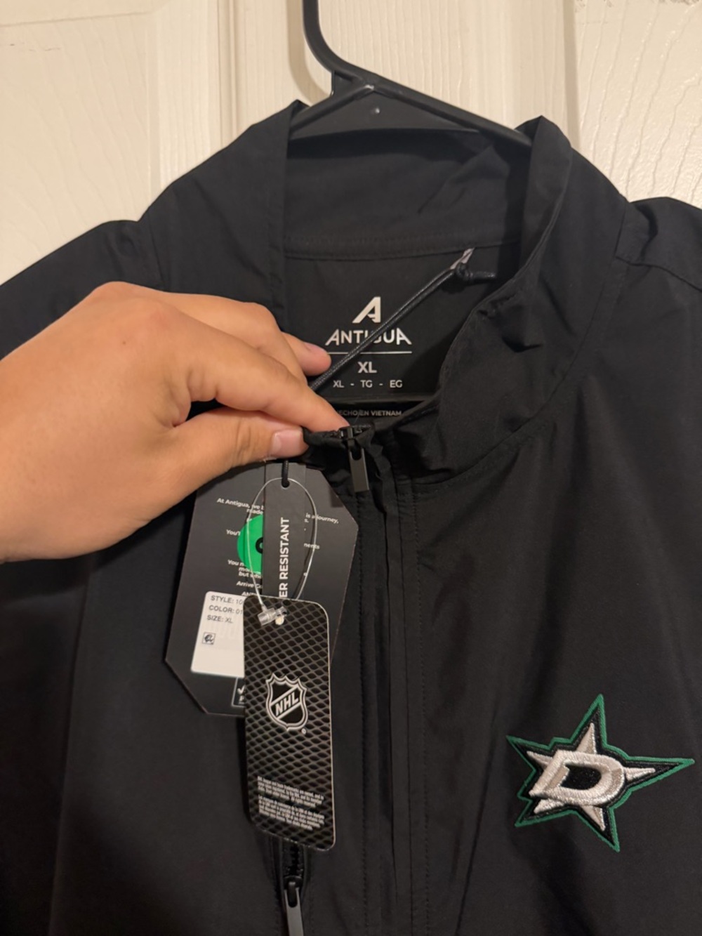 Antigua Black Men’s ' Dallas Stars Rain Jacket with Green Trim
